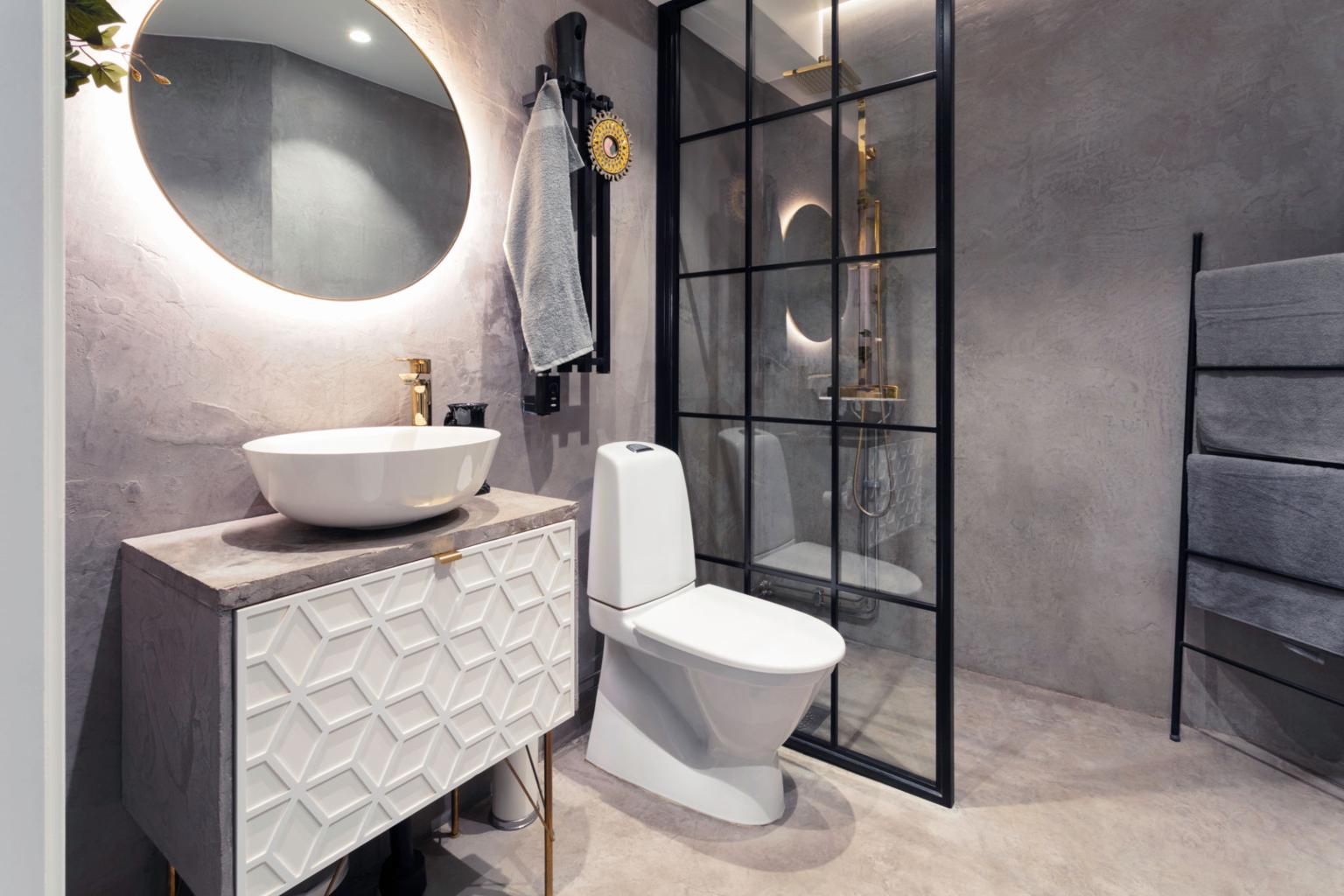 Nærbillede af en glat microcement overflade i en moderne stue